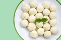 Homemade unbaked coconut balls on a plate Royalty Free Stock Photo