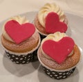 Homemade Vanilla Buttercream cupcake decorate with heart sugarpaste or marzipan