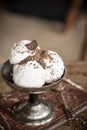 Homemade vanilla ice cream in vintage metal bowl