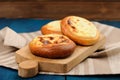 Homemade vatrushka, Russian pastry with cottage cheese on wooden