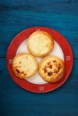 Homemade vatrushki, small Russian cakes with cottage cheese on d