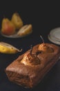 Homemade vegan chocolate cake with poached pears. Close-up view. Royalty Free Stock Photo