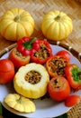 Homemade vegan grilled vegetables from stuffed red tomato, bell peppers, yellow pumpkin Royalty Free Stock Photo