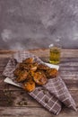 Homemade vegan pumpkin scones with thyme and seeds on wooden table with herbal tea Royalty Free Stock Photo