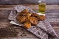 Homemade vegan pumpkin scones with thyme and seeds on wooden table with herbal tea Royalty Free Stock Photo