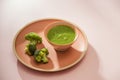 Homemade vegetable baby food. Broccoli puree for baby Royalty Free Stock Photo