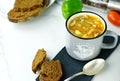 Homemade vegetable soup in enamel mug Royalty Free Stock Photo
