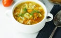 Homemade vegetable soup in white bowl