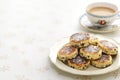 homemade Welsh cakes ( bakestones ) with a cup of milk tea Royalty Free Stock Photo
