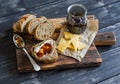 Homemade whole grain bread, cheese and figs jam. Delicious breakfast or snack. Royalty Free Stock Photo