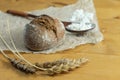 Homemade whole grain bread, wheat grains and spikelets. Spikelets of wheat, bread and flour. Spikelets, fresh wheat bread Royalty Free Stock Photo