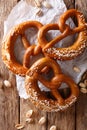 Homemade whole meal pretzels with salt close-up on the table. Ve Royalty Free Stock Photo