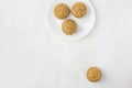 Homemade Whole Wheat Bran Muffin on White Plate. Breakfast Morning Healthy Pastry Baking Concept. Minimalist Style Top View