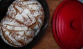 Homemade wholemeal bread in a dutch oven ,cast iron pan Royalty Free Stock Photo