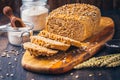 Homemade wholemeal spelt bread with sunflower seeds and baking ingredients