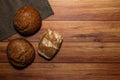 Homemade wholemeal various tastes loaves on a gray dishcloth. Royalty Free Stock Photo