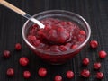 Homemade wild lingonberry jam in a glass bowl