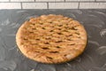 Homemade yeast dough pie. Pastries with sweet fruit filling. Close-up, selective focus Royalty Free Stock Photo