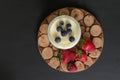 Homemade Yoghurt in a Jar with Fresh Strawberries and Blueberries on a Wooden Background Royalty Free Stock Photo