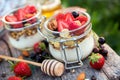 Homemade yogurt with berries in portion jars