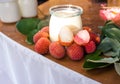 Homemade yogurt and fresh lychee in glass jars, selective focus. Healthy Food Royalty Free Stock Photo