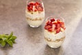 Homemade yogurt parfait with granola, strawberries, bananas and Chia seeds in glasses. Diet dessert with yogurt. Royalty Free Stock Photo