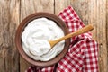 Homemade yogurt or sour cream in a rustic bowl