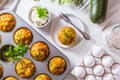 Homemade zucchini muffins with feta cheese and herbs