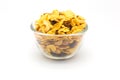 Homemaded Honey Caramel Cornflakes on white backgroundBowl of honey caramel cornflakes isolated on white