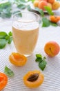Homenade apricot smoothie and fresh apricots