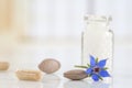 Homeopathy globules with borage flower Royalty Free Stock Photo