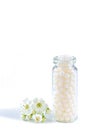 Homeopathy globules in bottles. homeopathy, naturopathy and alternative medicine. Alternative homeopathy medicine concept