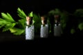 Homeopathy oil in vintage bottles black background. A bottle of homeopathic remedies.Homeopathy pills in vintage bottles on black Royalty Free Stock Photo