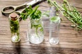 Homeopathy. Store up medicinal herbs. Herbs in glass on wooden table background Royalty Free Stock Photo