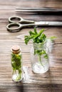 Homeopathy. Store up medicinal herbs. Herbs in glass on wooden table background