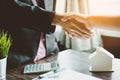 Agent and client shaking hands after signed document and done business . Royalty Free Stock Photo