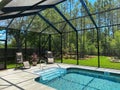 Homeowner Swimming Pool Cage in Florida. Bronze color. Royalty Free Stock Photo