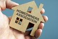 Homeowners Association HOA written on a model of home Royalty Free Stock Photo