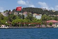 Homes along and turkish flag the Bosporus Turkey