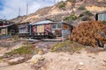 Homes in disrepair that are being restored along the beach and coastline of Crystal Cove