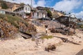 Homes in disrepair that are being restored along the beach and coastline of Crystal Cove