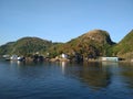 Homes next to Norwegian fjords