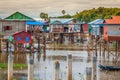 Homes on stilts on the floating village of Kampong Phluk, Tonle Royalty Free Stock Photo