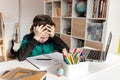 Homeschooled boy under stress Royalty Free Stock Photo