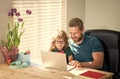 homeschooling and elearning. back to school. father and son in eyeglasses use computer Royalty Free Stock Photo