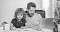 homeschooling and elearning. back to school. father and son use computer at home. Royalty Free Stock Photo