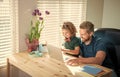 homeschooling and elearning. back to school. happy dad and son in glasses use laptop Royalty Free Stock Photo