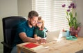 homeschooling and elearning. back to school. smiling father and son in glasses use computer Royalty Free Stock Photo