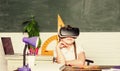 Homeschooling online. Girl kid study in virtual school. Virtual education. Child cute pupil wear hmd vr glasses. Virtual