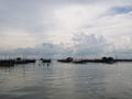 Homestay and floating basket in lake at Kohyo, Songkhla, Thailand with beautiful sky and clouds. This is traditional fisheries are